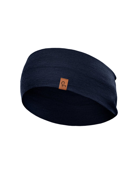 A dark navy blue, finely knitted headband displayed in a three-dimensional, rounded shape against a pure white background. A small, square brown leather logo patch is centered near the bottom front edge.