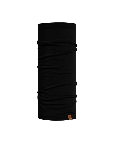 A product shot of a solid black tubular neck gaiter displayed upright against a pure white background. The fabric shows natural horizontal folds, and a small, square brown leather logo patch is visible near the bottom right edge.