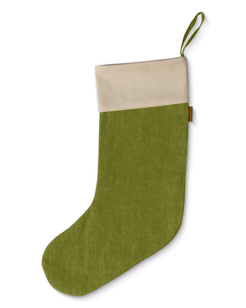 Green and beige Christmas stocking on a white background