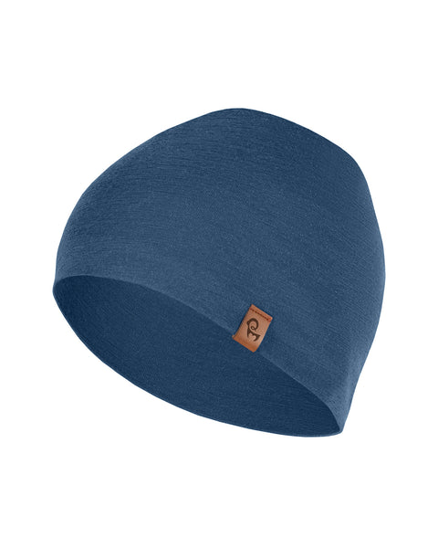 Blue Merino wool beanie laid flat on a white background – lightweight, breathable, and soft winter hat for kids and teens.