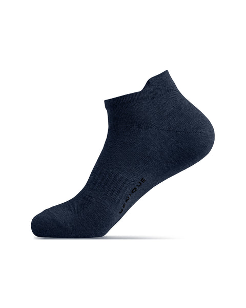 A side profile view of a dark blue ankle sock on a foot model, featuring the word "MENIQUE" printed along the lower side of the foot.