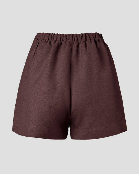 Linen pull-on shorts with elastic waistband and pockets.