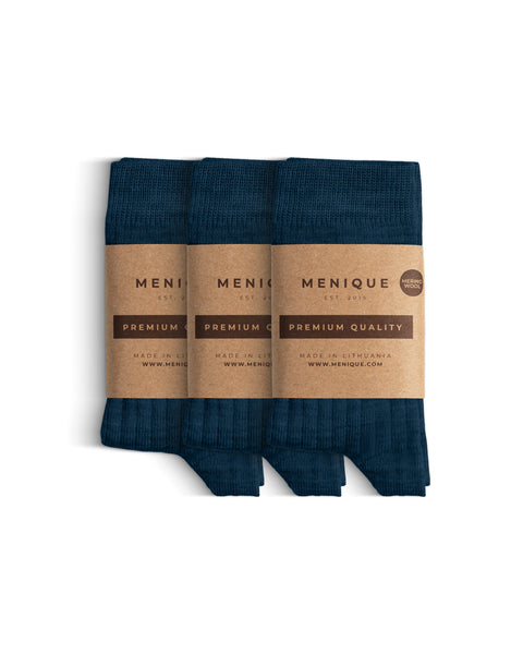 A 3-pack of kids’ dark blue ribbed merino wool socks with “Menique Premium Quality” labels.