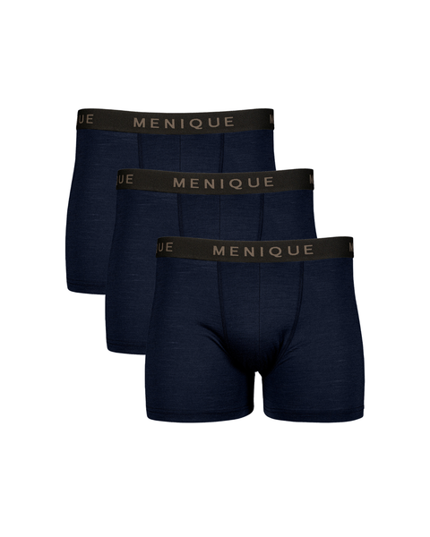 A flat-lay product shot of three identical pairs of men's short boxer briefs in a dark navy blue color. They are arranged in a staggered vertical stack. Each pair features a contrasting black elastic waistband with "MENIQUE" woven in light brown text. The background is pure white.