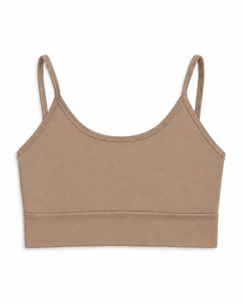 A beige bralette with a scoop neckline, wide bottom band, and thin straps displayed on a white background.